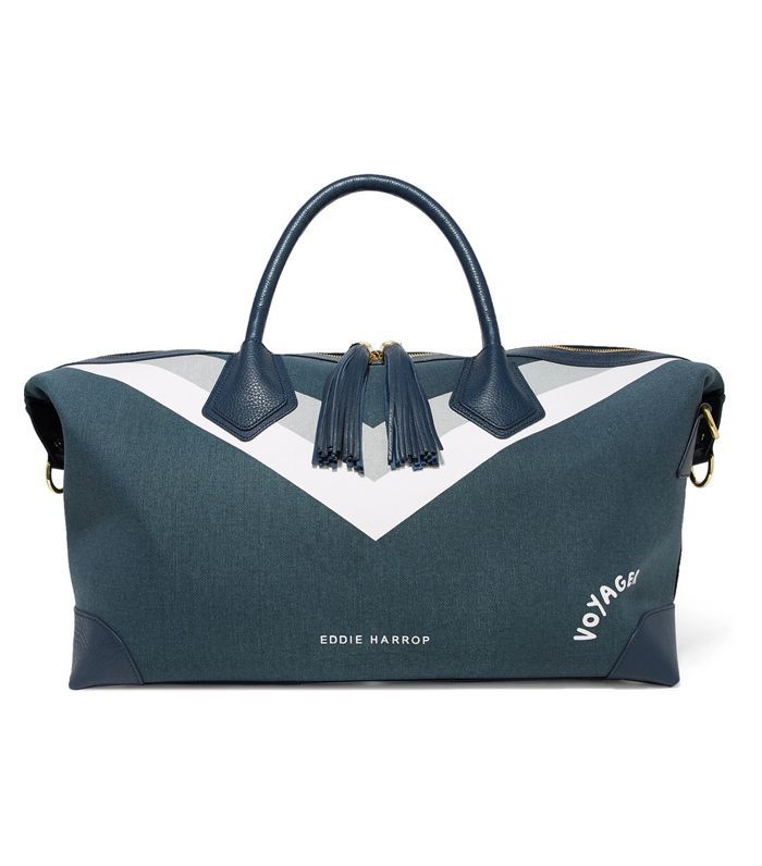 旅行者真皮装饰的印花帆布周末袋