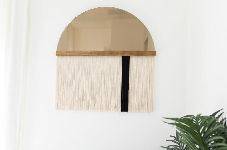 流苏花边的镜子“class=