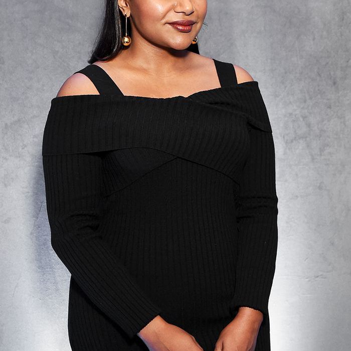 敏迪·卡灵“class=