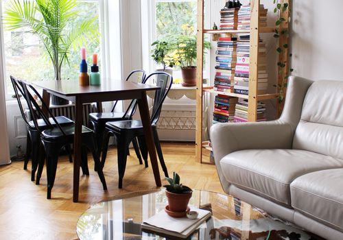 living and dining area in 525 square foot apartment