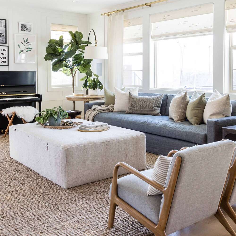 best living room ideas - blue couch and neutral accents