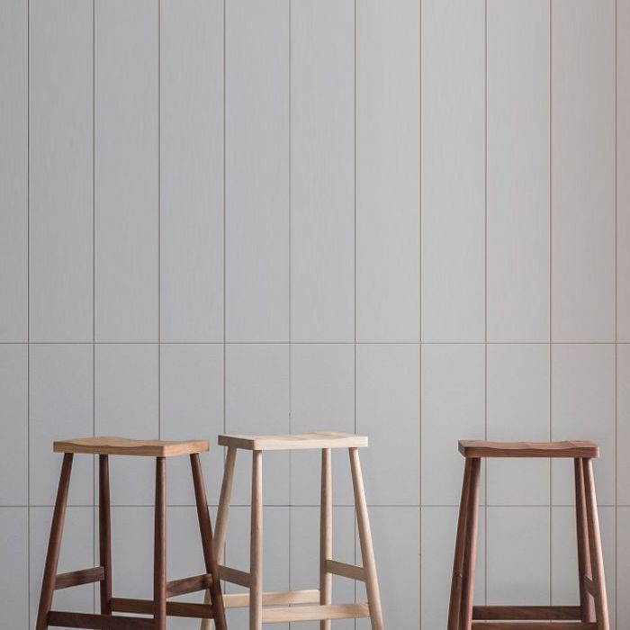 汉普顿周末度假的凳子”class=