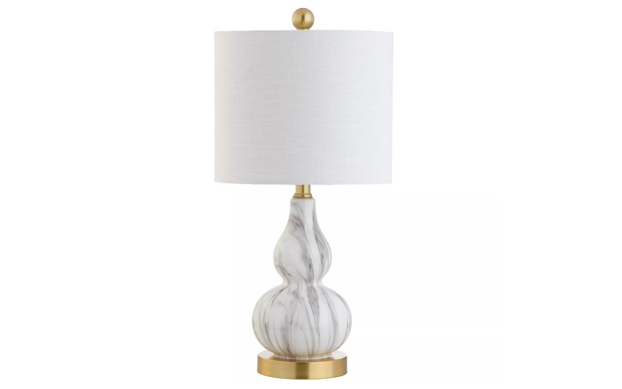 用甲台灯大理石灰碱和白麻灯罩和黄铜的口音。