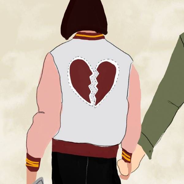 一对夫妇步行拿着从背后双手的说明