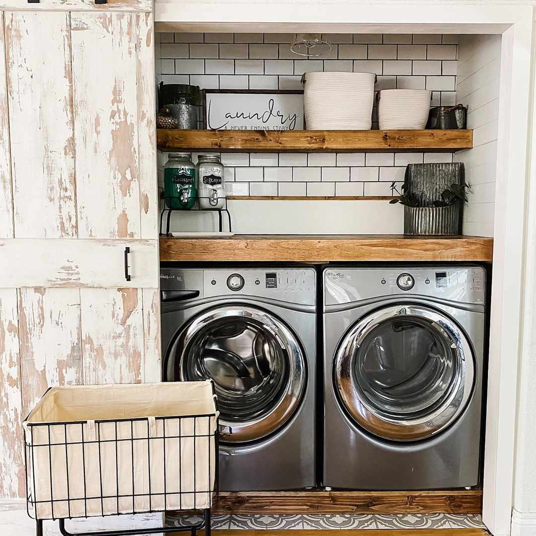Laundry room in a closet with shelves