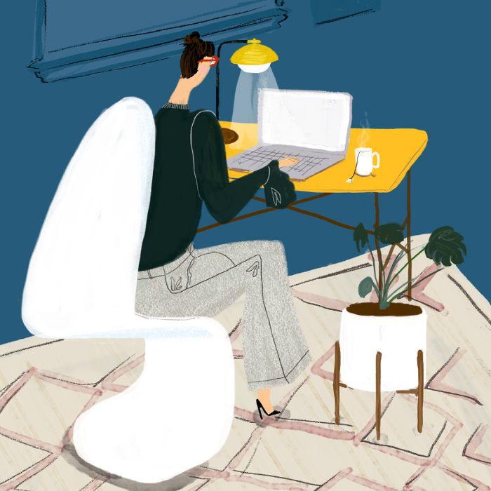 一幅妇女伏案工作的插图