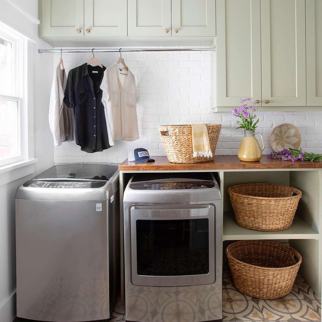 Laundry room with cabinets and shelves