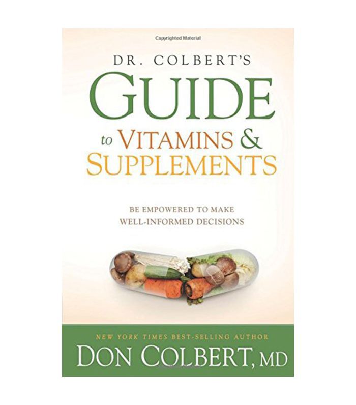 科尔伯特博士的指南与绿色，橙色和黄色写作维生素及补充剂书的封面。