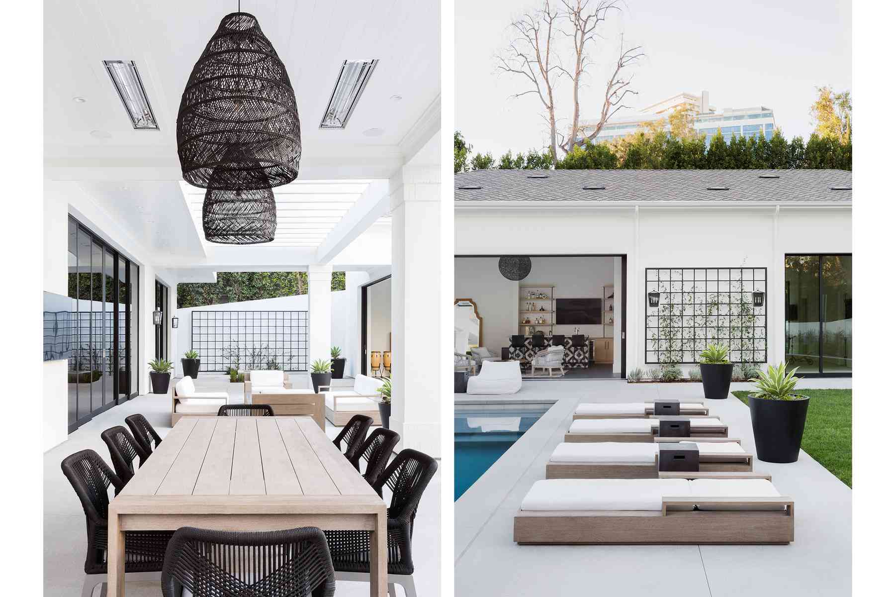 带有餐桌和金属墙面艺术的户外空间。