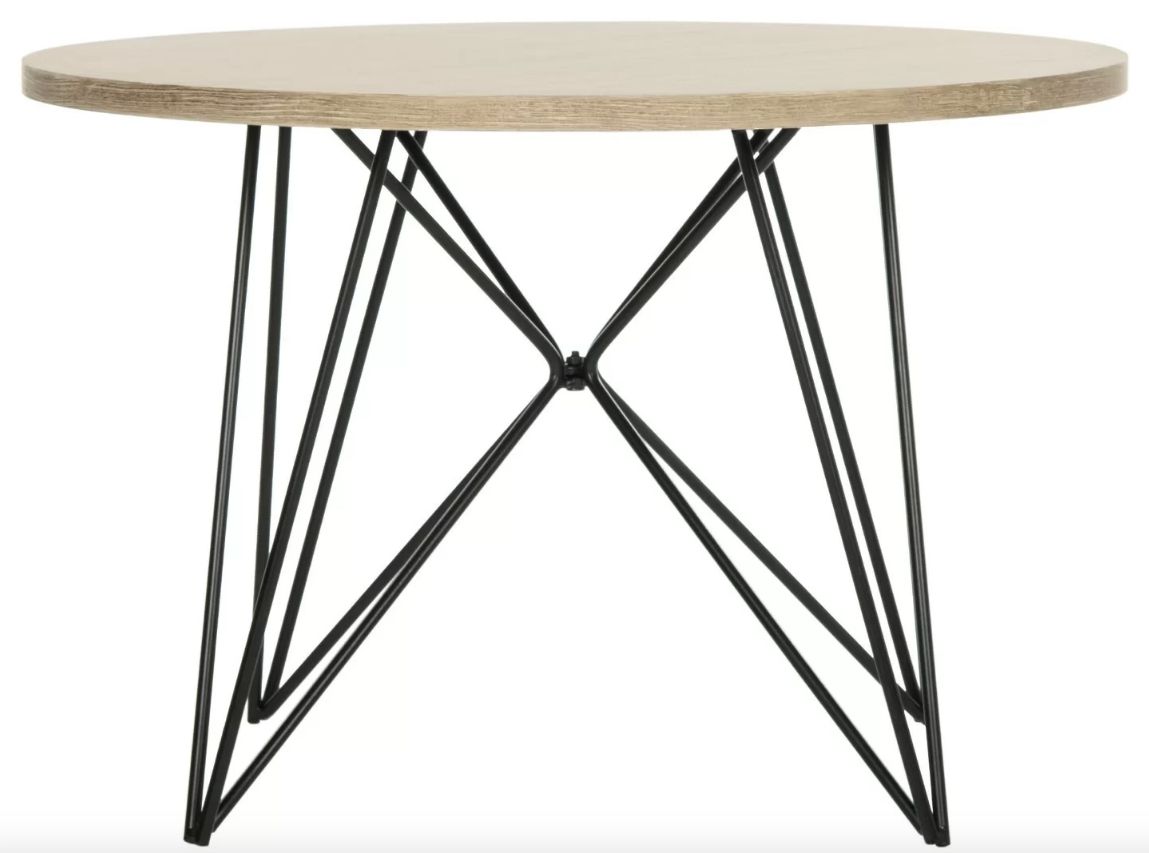 用轻木顶和黑色金属发夹风格腿的圆形咖啡桌