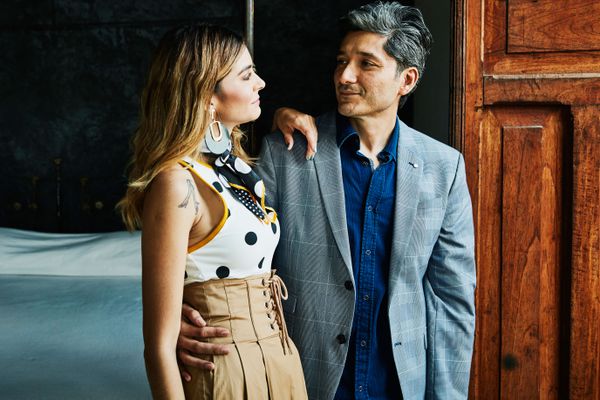 middle aged man and woman looking at each other