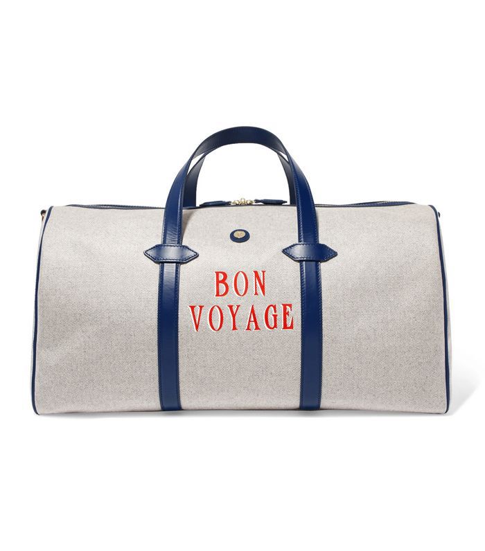 主线粗呢皮革装饰的印花帆布周末袋