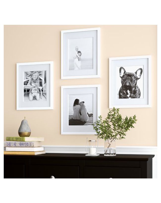 一套四款白色框架画廊墙