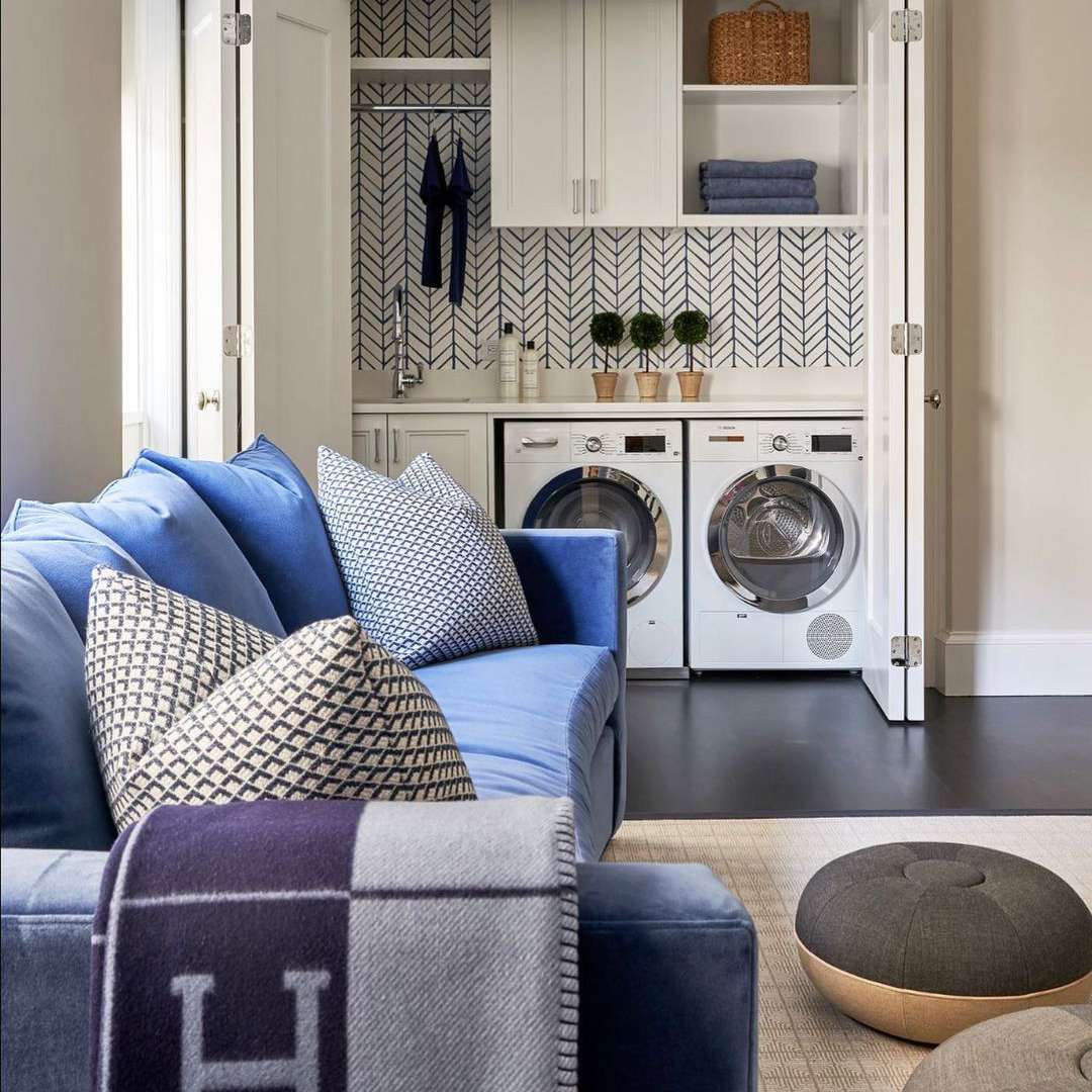 Laundry room in a living room closet