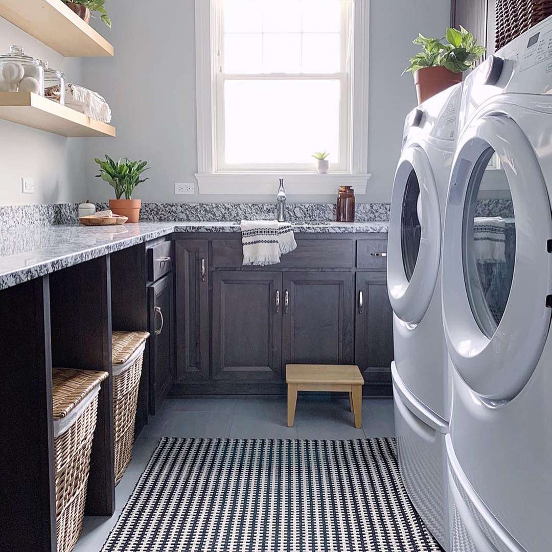 Laundry room with unfinished wood shelves